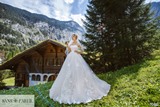Bridal Dress: Sans Pareil Bridal Collection 2017: 1060 - Floral appliques on sheer sleeves and neckline of strapless wedding gown  